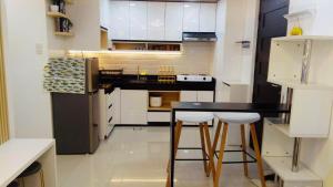 Greenwoods Travel Lodge Condotel