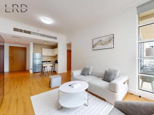 Charming 1BR Apartment with Canal View in Business Bay