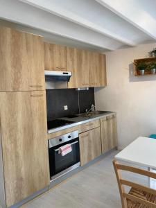 Appartements Logement avec alcove et jardin proche du Chateau : photos des chambres