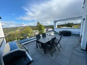 Penthouse mit Ausblick - Springen