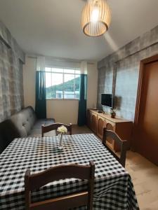 Apto central com estacionamento