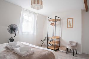 Appartements TRIPLEX cathedrale parking gratuit : photos des chambres