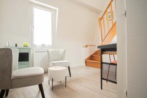 Appartements TRIPLEX cathedrale parking gratuit : photos des chambres