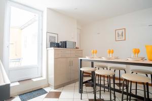 Appartements TRIPLEX cathedrale parking gratuit : photos des chambres