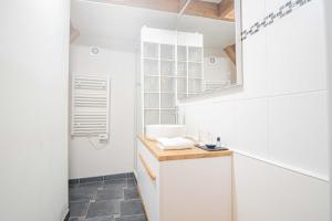 Appartements TRIPLEX cathedrale parking gratuit : photos des chambres