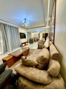 Modern 3BR Apartment, Prime Dokki Location