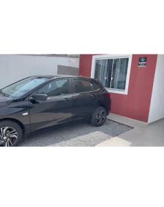 Casa a 150m da praia com piscina e churrasqueira
