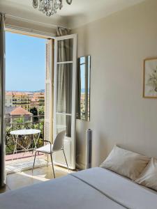 Appartements Studio avec vue panoramique - Residence du Louvre : photos des chambres