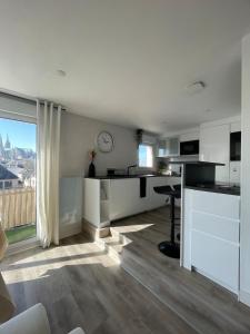 Appartements Elegance et confort-vue sur la cathedrale - Parking : photos des chambres