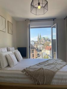Appartements Elegance et confort-vue sur la cathedrale - Parking : photos des chambres