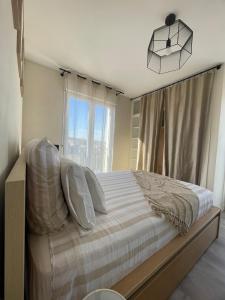 Appartements Elegance et confort-vue sur la cathedrale - Parking : photos des chambres