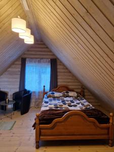 Atostogų namelis SAMANOTA PAMIŠKĖ su kubilu ir pirtimi