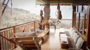 BohOdyssey Hallan a Traditional Village Stay with Panoramic Mountain Views