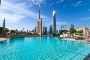 Vibrant Luxe Burj Khalifa Views-Dubai Mall Access by Maxx Value Homes