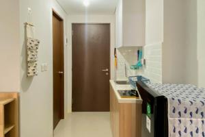 Minimalist Studio Apartment at Transpark Juanda Bekasi Timur By Travelio