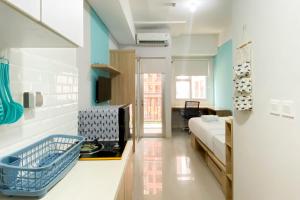 Minimalist Studio Apartment at Transpark Juanda Bekasi Timur By Travelio