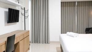 Elegant and Best Choice Studio at Grand Sungkono Lagoon Apartment By Travelio