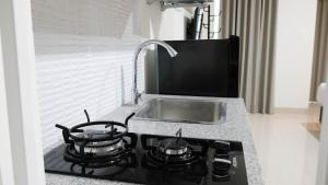 Elegant and Best Choice Studio at Grand Sungkono Lagoon Apartment By Travelio
