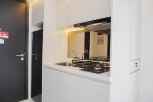 Elegant and Restful Studio at Casa De Parco Apartment By Travelio