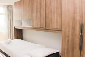 Great Location Studio Room at Springlake Summarecon Bekasi Apartment By Travelio