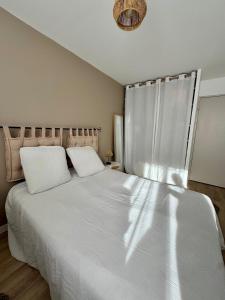 Appartements Magnifique T3 tout equipe : photos des chambres