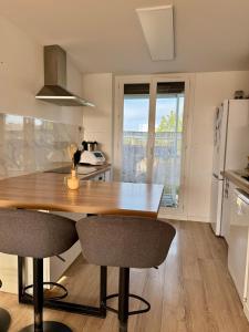 Appartements Magnifique T3 tout equipe : photos des chambres