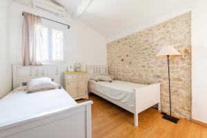 Villas Mas de 190m2 Climatise avec Piscine et Cuisine d-ete - 10 pers : photos des chambres