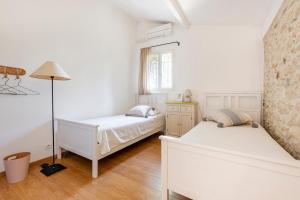 Villas Mas de 190m2 Climatise avec Piscine et Cuisine d-ete - 10 pers : photos des chambres