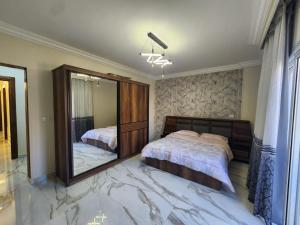 Spacious Modern Apartment with Wide Garden View in Al Rehab 2