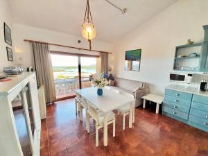 ISA-Residence with swimming pool in Marinella just 300 mt from the sea, apartments with sea view