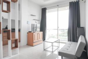 Nice and Comfort 1BR at Citralake Suites Apartment By Travelio