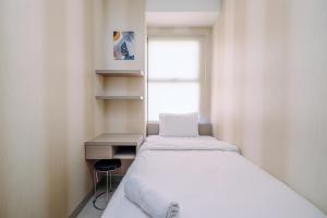 Elegant and Comfy 2BR at Transpark Cibubur Apartment By Travelio