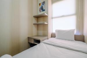 Elegant and Comfy 2BR at Transpark Cibubur Apartment By Travelio