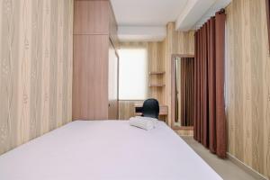 Elegant and Comfy 2BR at Transpark Cibubur Apartment By Travelio