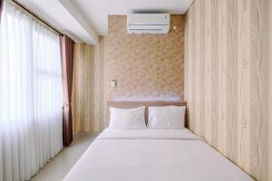 Elegant and Comfy 2BR at Transpark Cibubur Apartment By Travelio
