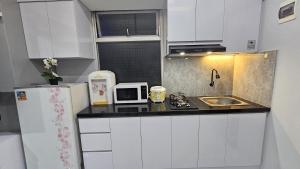 The Jarrdin Apartemen Cihampelas A20 by NEMUI ROOM