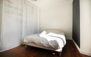 Appartements Le 1871 - T3 Calme et Spacieux : photos des chambres