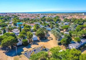 Campings Les mobil homes de Naka, une entree gratuite adulte pour la Reserve Africaine de Sigean : photos des chambres