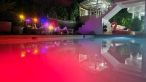 A Touch of Pink Secret Eco Retreat with Pool, Starlink WiFi, Netflix, Mountain Views - Peaceful Stay in Puerto Princesa Near Underground River, Firefly Watching, and Waterfalls - Perfect Stop Between El Nido, Port Barton, and Puerto City - Scooter Re