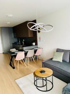 NEW apartment with free garage parking near the airport