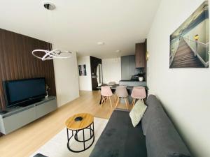 NEW apartment with free garage parking near the airport