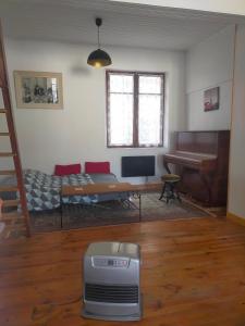 Appartements Au coeur de Chalabre, bastide medievale, pres du lac de Montbel : photos des chambres