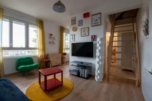 Appartements Le Nid Colore T2 petit dej- offert : photos des chambres