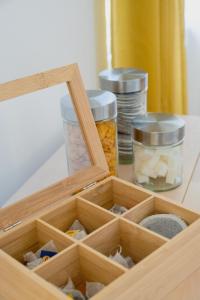 Appartements Le Nid Colore T2 petit dej- offert : photos des chambres