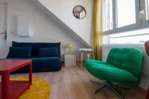 Appartements Le Nid Colore T2 petit dej- offert : photos des chambres