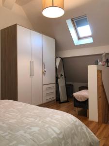 Appartements Gite Chez Mathilde - hebergement de charme alliant cachet et modernite a 5 minutes de Colmar : photos des chambres