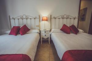 Aloreña 2 con balcones al la calle Real