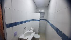 Casa aconchegante com piscina a 50 metros da praia