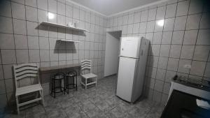 Casa aconchegante com piscina a 50 metros da praia