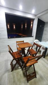 Casa aconchegante com piscina a 50 metros da praia